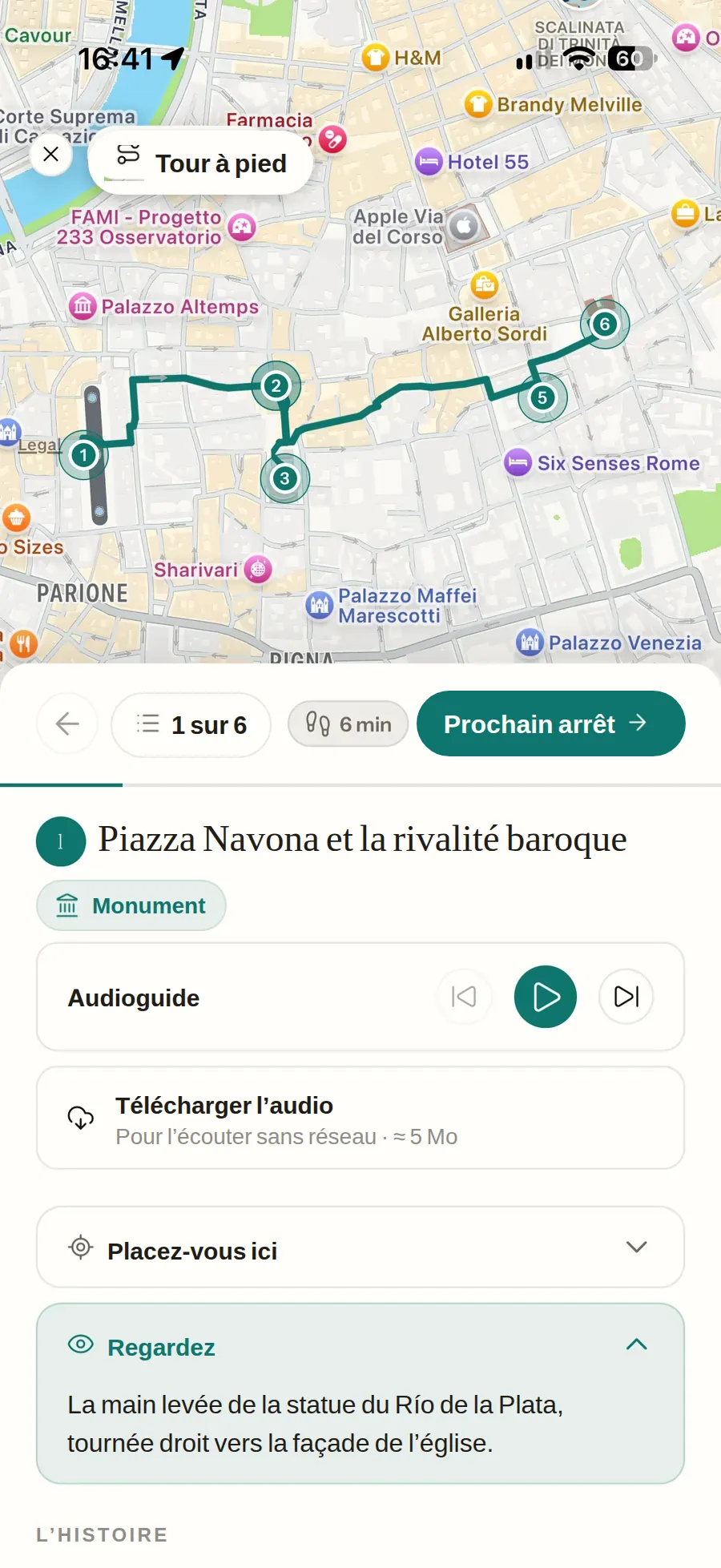 Une balade guidée dans Rome : la carte avec l’itinéraire tracé et les
                    six étapes numérotées, l’étape 1 sur 6 à 6 minutes de la suivante,
                    Piazza Navona et la rivalité baroque avec son audioguide téléchargeable
                    pour l’écouter sans réseau, le point où se placer et la note sur quoi
                    regarder ouverte sur la main levée de la statue du Río de la Plata.